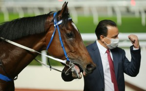 Caspar Fownes pumps his fist after Enrich Delight’s victory. Photos: Kenneth Chan