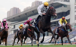 Vincent Ho guides Golden Sixty to victory in the Group One Hong Kong Mile. Photo: Kenneth Chan