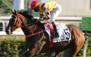 Karis Teetan salutes aboard Champion’s Way. Photos: Kenneth Chan