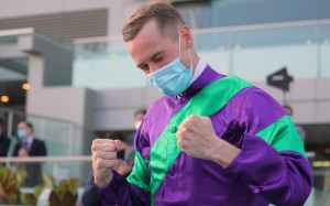 Blake Shinn pumps his fists after winning the Classic Mile aboard Excellent Proposal. Photos: Kenneth Chan
