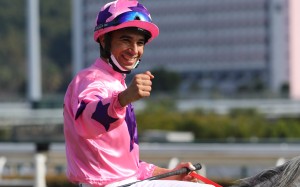 Joao Moreira celebrates his Group One victory aboard Hot King Prawn on Sunday. Photos: Kenneth Chan