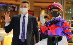 Douglas Whyte and Jerry Chau celebrate their trebles at Happy Valley on Wednesday night. Photo: Kenneth Chan