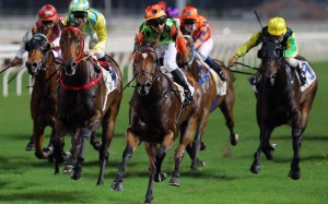 Jerry Chau pumps his first as Carroll Street beats Winner Method at Sha Tin on Wednesday night. Photos: Kenneth Chan