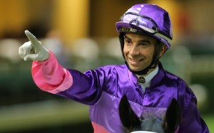 Joao Moreira celebrates one of his five winners at Happy Valley on Wednesday night. Photo: Kenneth Chan