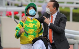 Jockey Joao Moreira and trainer Caspar Fownes celebrate their Derby win with Sky Darci in March. Photo: Kenneth Chan