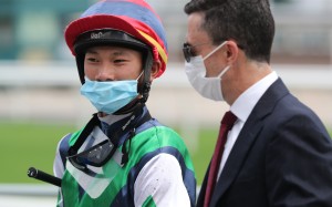 Jerry Chau talks to his boss Douglas Whyte after their win on Sunday. Photo: Kenneth Chan