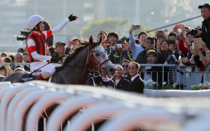 Japanese jockey Masami Matsuoka celebrates winning the 2019 Hong Kong Cup aboard Win Bright. Photos: Kenneth Chan