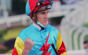 Chad Schofield celebrates a victory aboard Fantastic Treasure. Photo: Kenneth Chan