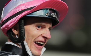 An animated Zac Purton after breaking Douglas Whyte’s prize-money record. Photos: Kenneth Chan