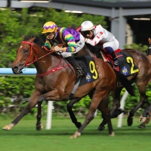 Jerry Chau, here riding The Perfect Match (#9), enjoyed a stand-out season in Hong Kong last campaign, racking up 48 winners. Photo: Kenneth Chan.