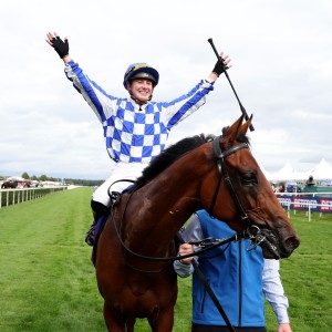 Saffie Osborne celebrates her record-breaking St Leger win on Highwayman. Photos: HKJC