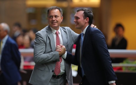 Caspar Fownes celebrates a Happy Valley win with son Ronan. Photos: Kenneth Chan