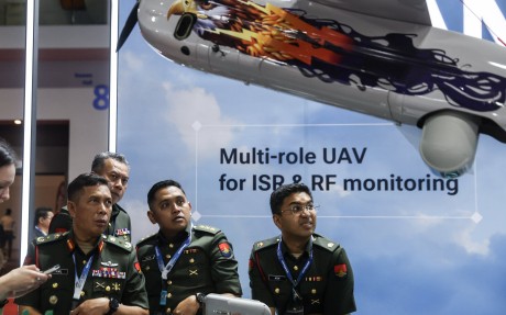 Malaysian army officers visit the booth of Special Technology Control, a Russian developer of unmanned systems, at the Defence Services Asia exhibition in Kuala Lumpur, Malaysia, on Tuesday. Photo: EPA