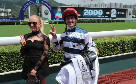Zac Purton and wife Nicole celebrate his 1,998th Hong Kong winner. Photos: Kenneth Chan