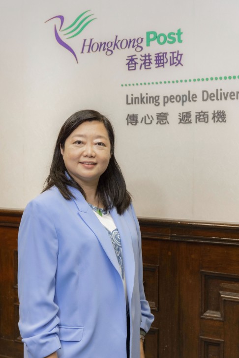 Hongkong Post Senior Director (Business Development) Estella Chow proudly presents a series of new postal technologies.