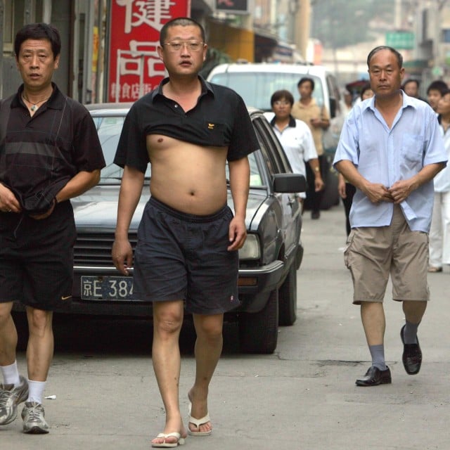 Beijing Bikini Chinese Government Cracks Down On Men Baring Midriffs Goldthread The part of the human body between the chest and the waist: beijing bikini chinese government
