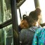Asylum-seeking migrants children from Honduras Larita, 2, and Lidia, 3, sleep in their mothers arms as they board the bus to be transported by the US Border Patrols after crossing the Rio Grande river into the United States from Mexico in La Joya, Texas, this month. Photo: Reuters