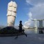 Uncertain job prospects, online commentary and stricter conditions risk making Singapore a less welcoming destination. Photo: Xinhua