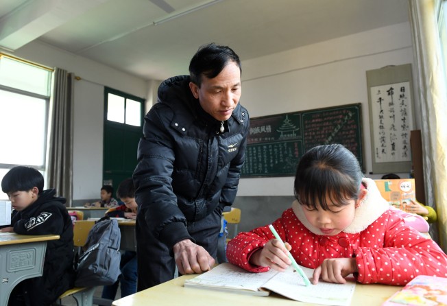 Typically, Chinese primary school pupils take extracurricular tutoring on top of their studies on campus.  Photo: Xinhua