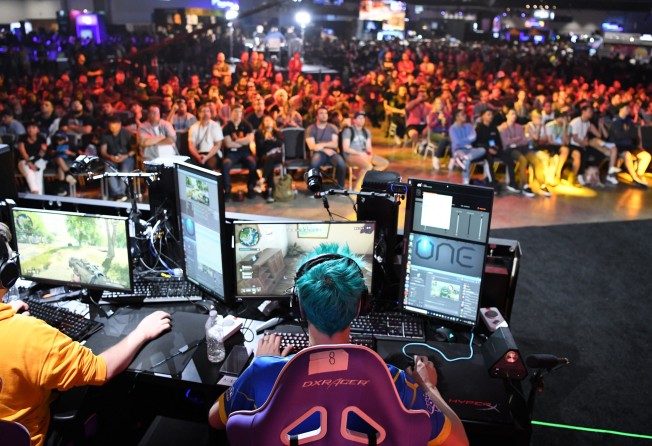 Esports athlete Tyler “Ninja” Blevins plays Call of Duty: Black Ops 4 during the Doritos Bowl 2018 at TwitchCon 2018 in California’s San Jose Convention Center on October 27, 2018. Photo: Getty Images