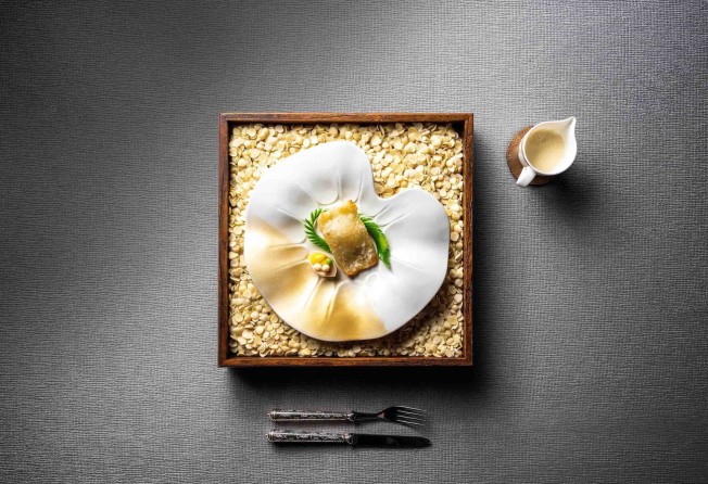 Pan-fried fish maw with almond consommé. Photo: Man Ho