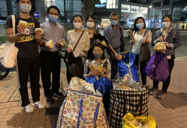 Volunteers from  Breadline are directed by an app to pick up unused baked goods from participating businesses and deliver them to charities for distribution to Hong Kong’s needy. Photo: Breadline