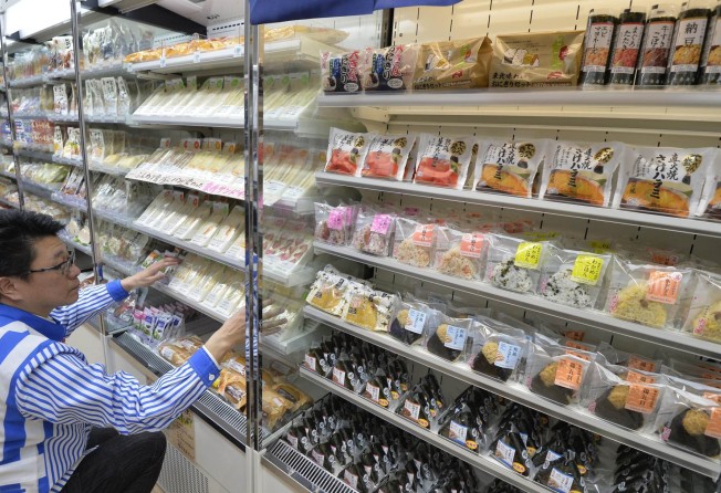 Lawson convenience shops in Japan use artificial intelligence to estimate if food items will go unsold or fall short of demand. Photo: Kyodo News Stills via Getty Images