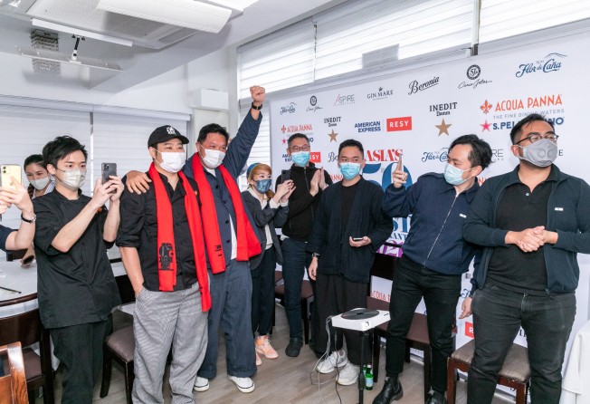 Staff of The Chairman in Central, Hong Kong, celebrate the Cantonese restaurant being named No 1 on the Asia’s 50 Best Restaurants list for 2021. Photo: Lily Yu/Asia’s 50 Best Restaurants