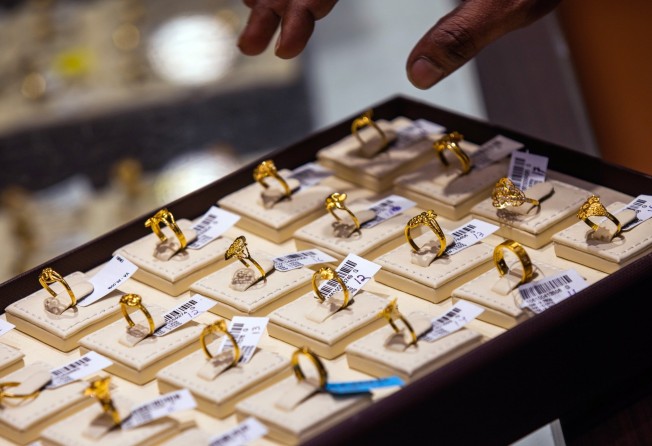 Gold rings inside a store in India. ​Jewellers see the current sales momentum lasting until May. Photo: Bloomberg 