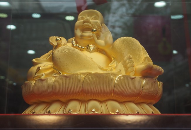 A gold Buddha for sale in Shanghai. In China, gold jewellery consumption is set to grow 28 per cent in 2021. Photo: Shutterstock