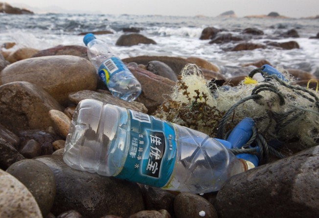 Discarded plastic water bottles washed up on a beach in Lung Ha Wan, New Territories, Hong Kong. Photo: EPA-EFE