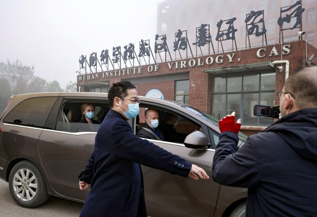 Members of the World Health Organization team tasked with investigating the origins of Covid-19 arrive at the Wuhan Institute of Virology in February. Photo: Reuters
