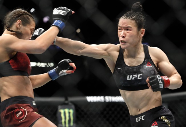 Zhang Weili punches Joanna Jedrzejczyk during their strawweight title fight at UFC 248. Photo: AP