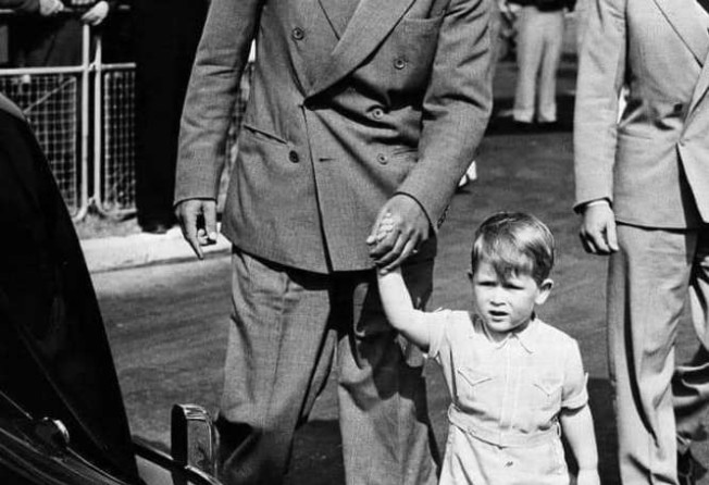 Prince Philip with a young Prince Charles in 1951. Photo: @OfficialSMPak/Twitter