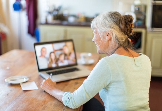 Keep in touch with loved ones by regularly video-calling them. Photo: Getty Images