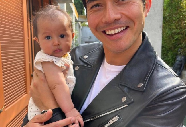 Henry Golding and his daughter. Photo: @henrygolding/Instagram