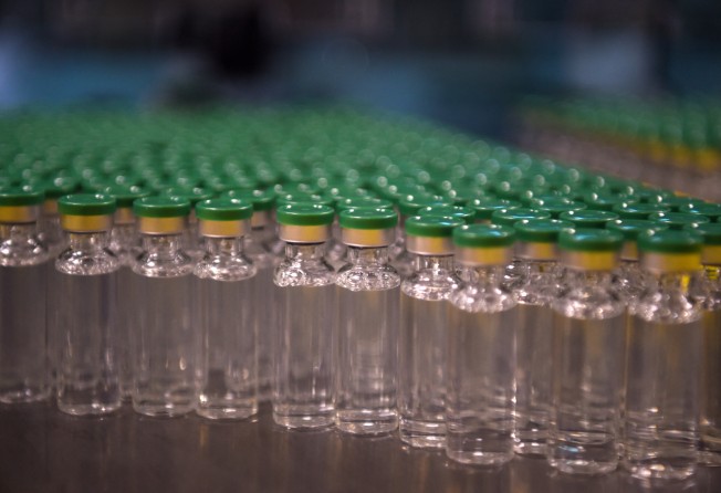 Vials of Covishield, AstraZeneca-Oxford’s Covid-19 vaccine, inside a lab where they are being manufactured at India’s Serum Institute on January 22, 2021. Photo: AFP