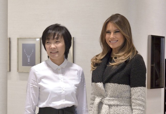 Melania Trump also received pearl earrings from Japanese First Lady Akie Abe. Photo: AFP 
