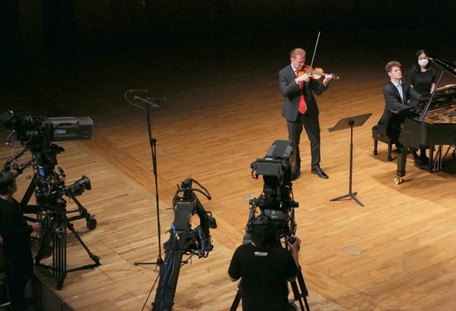 A rare performance by conductor Christoph Poppen on the violin, with pianist Alexander Krichel, filmed as part of the Hong Kong Sinfonietta concert film Back on Stage II (Quarantined!). Photo: HK Sinfonietta Ltd