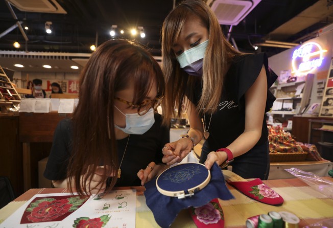 One of the designs students learn is a marigold and moon bead embroidery, which traditionally represents the Mid-Autumn Festival. Photo: SCMP/Xiaomei Chen