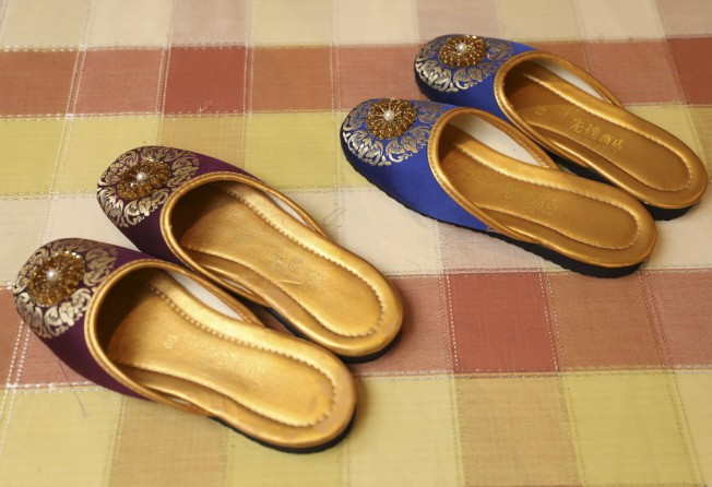 Marigold and Moon Bead embroidery slippers made by Wong. Photo: SCMP/Xiaomei Chen