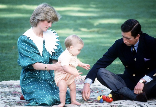Prince Charles and Princess Diana pose for press photographers at Government House, Wellington, New Zealand, with baby Prince William, in April 1983. Photo: Mirrorpix/Getty Images