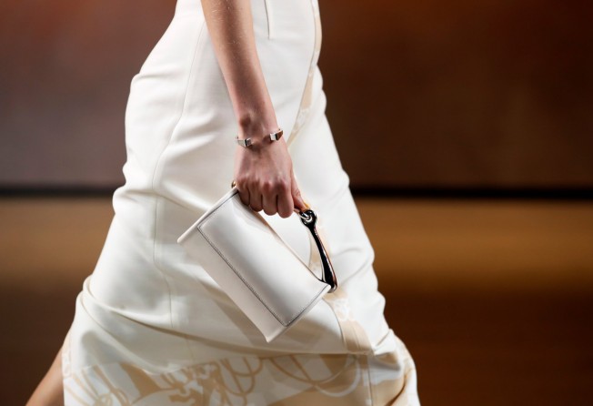A detail of a purse as a model presents a creation by designer Nadege Vanhee-Cybulski as part of the spring/summer 2022 women’s ready-to-wear collection show for fashion house Hermès during Paris Fashion Week in Paris, France, on October 2. Photo: Reuters