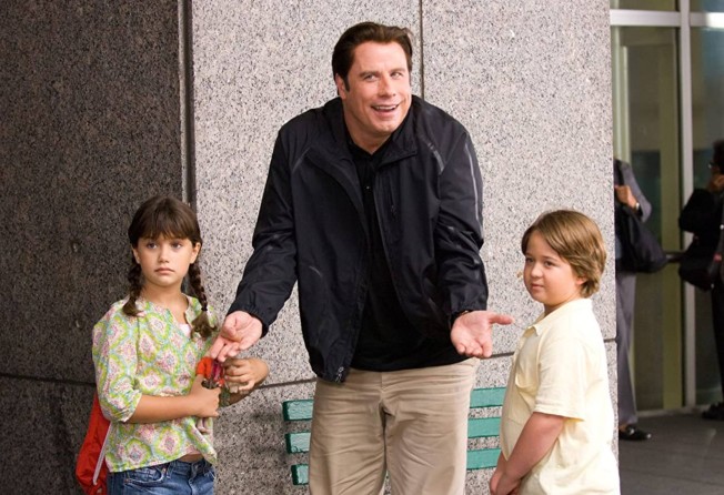 Ella Travolta with her dad John and Conner Rayburn on the set of Old Dogs. Photo: IMDb.com