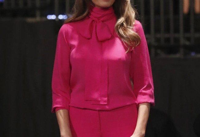 Melania Trump appears before the second presidential debate at Washington University in St. Louis, Missouri, on October 9, 2016 – wearing a Gucci pussy bow blouse. Photo: AFP Photo