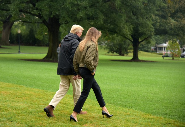 US President Donald Trump and Melania Trump walk to board Marine One before departing the White House en route to Corpus Christi, Texas, to see the recovery efforts under way in the aftermath of Hurricane Harvey. Photo: Xinhua