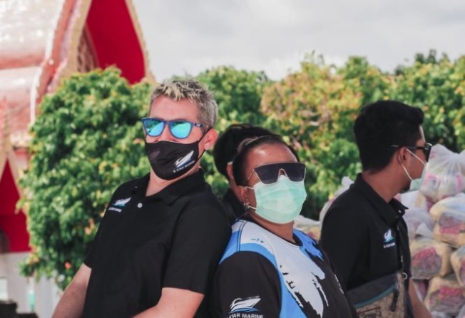 Stenning (left) and Khun Zeera are part of One Phuket, which distributes Life Bags, each of which contains essentials such as rice, tinned sardines and cooking oil.