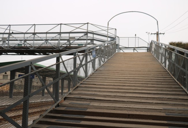 A passenger footbridge over Tangshan South Station that dates back to Kinder’s time. Photo: Thomas Bird