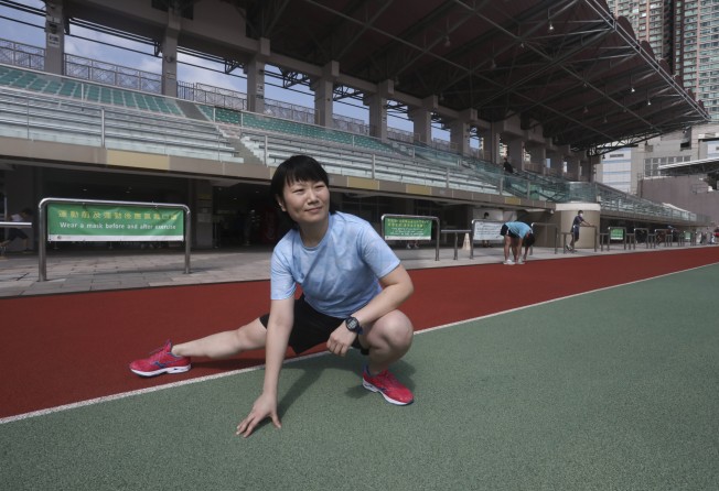 Chan does some stretches at Tsing Yi Sports Ground. Photo: Jonathan Wong