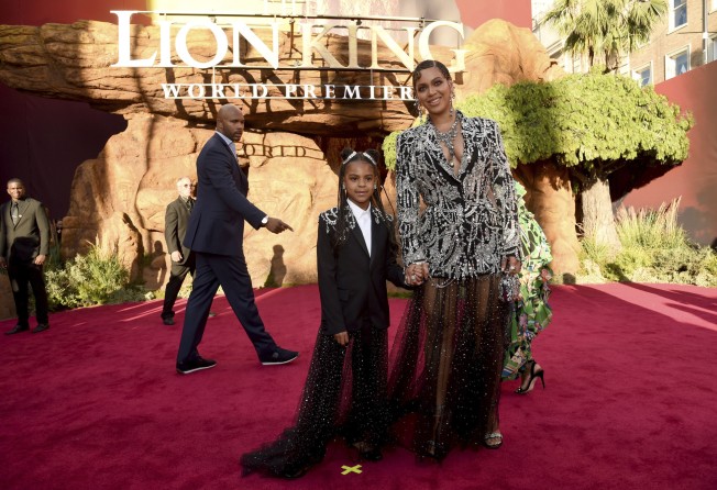 Beyoncé, right, and her daughter Blue Ivy Carter arrive at the world premiere of The Lion King in July 2019, at the Dolby Theatre in Los Angeles. Photo: Invision/AP
